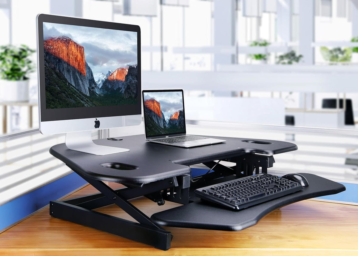 Rocelco 46" Height Adjustable Corner Standing Desk Converter - Quick Sit Stand Up Dual Monitor Riser - Gas Spring Assist Tabletop Computer Workstation - Large Keyboard Tray - Black (R CADRB-46)